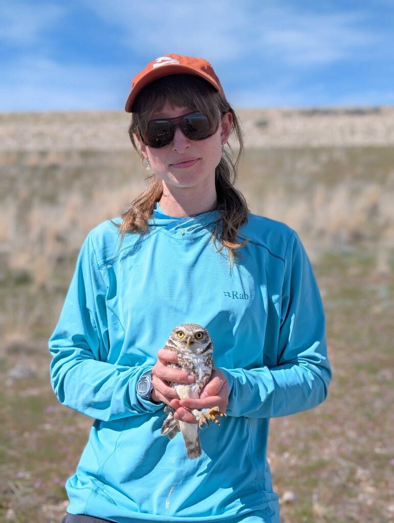 Michaela LaPlante with a Burrowing Owl